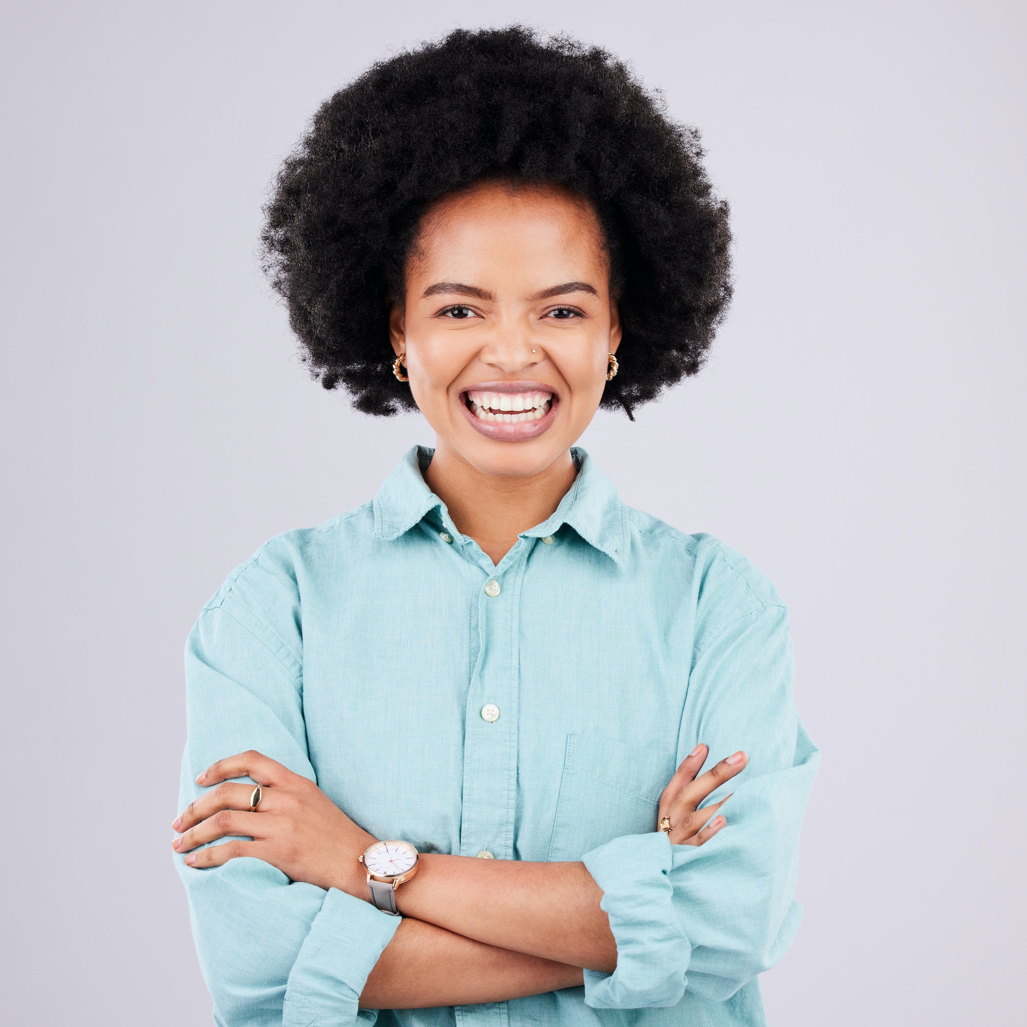 Happy, arms crossed and portrait of black woman in studio for confidence, positive and empowerment.